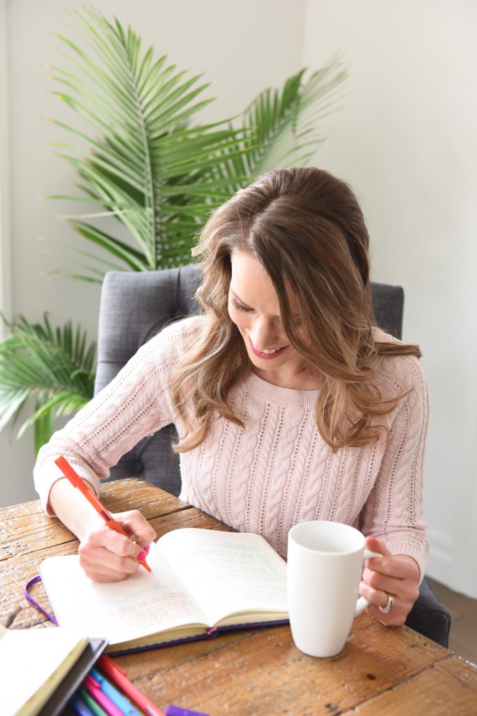 Kimberly Muhtar journaling about how to stop the negativity in her home Episode 43 of the Renewed Mama Podcast