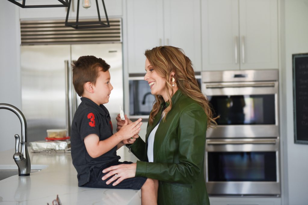 mother correcting or disciplining her son for only three behaviors, deliberate disobedience, dishonor, and bad attitude.  Christian parent coaching, positive parenting solutions